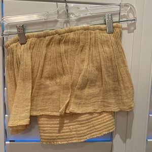 Tan tube top, never worn, blue life.